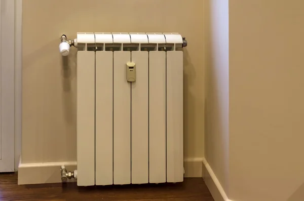 Part of kitchen and heating radiator — Stock Photo, Image