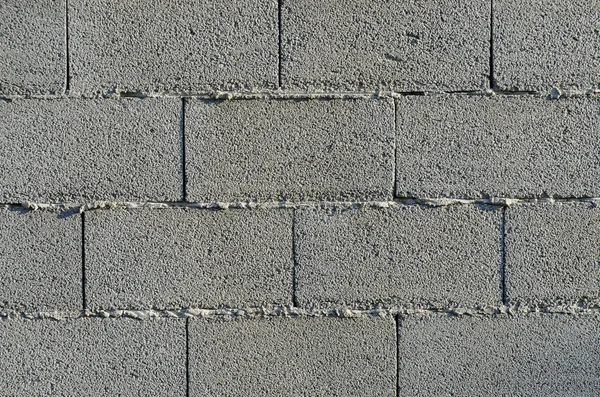 Arka plan beton bloklarla yeni duvar
