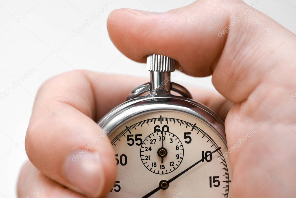Stopwatch button presses hand finger on white background, isolate.