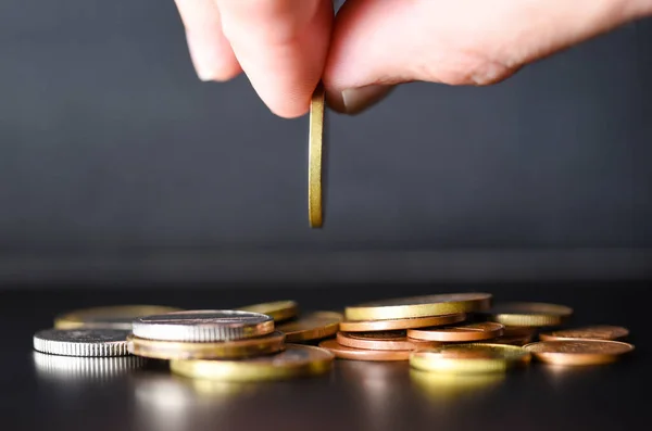 Hand Drops Coin Stack Coins Black Background — Stock Photo, Image