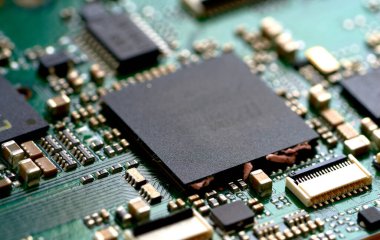  Close up of electronic circuit board with microchips and microchips                             