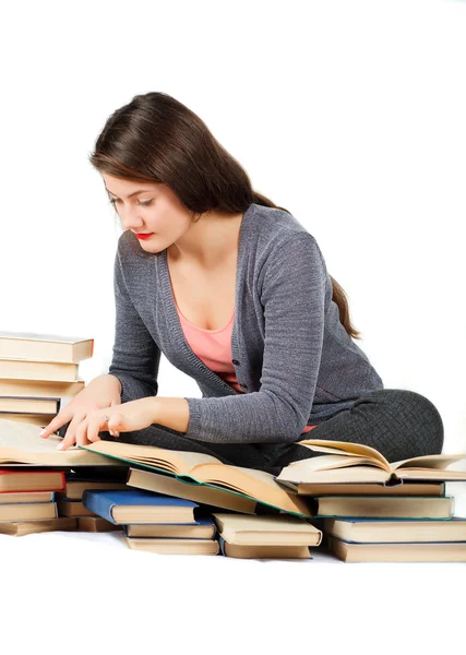 Девушка с книгами изолированы на белом фоне . — стоковое фото