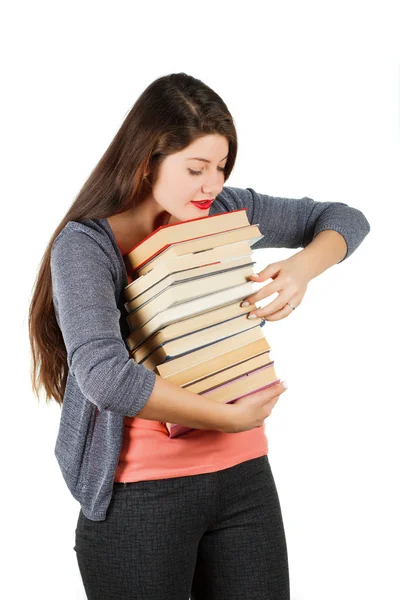 Девушка с книгами изолированы на белом фоне . — стоковое фото