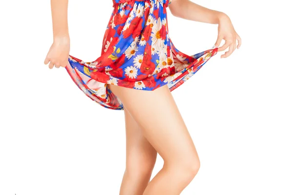 かなり短いスカートで覆われた美しいモデルの脚. ストック写真