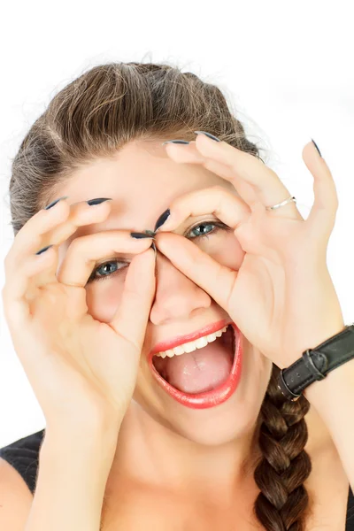 Emotions on the face of a girl with two plaits — Stock Photo, Image