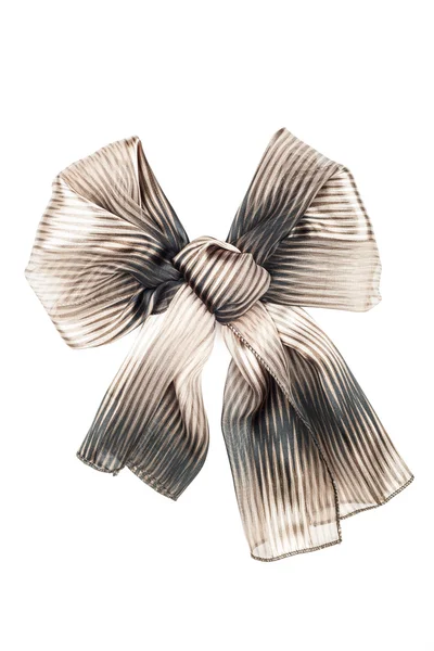 Foulard en soie. Foulard en soie beige plié comme un nœud de bowknot — Photo