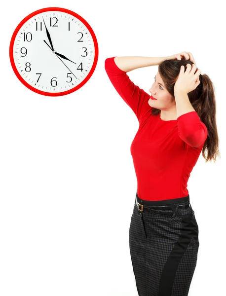 Emotions of girl , who looks at the clock — Stock Photo, Image