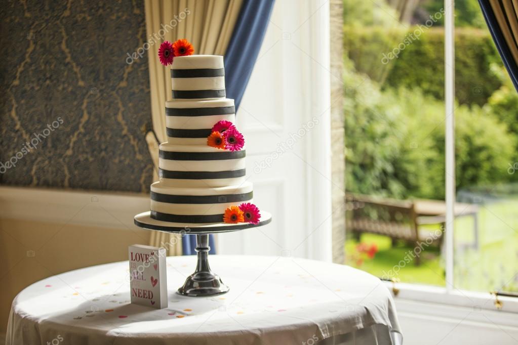 Classic wedding cake in natural window light