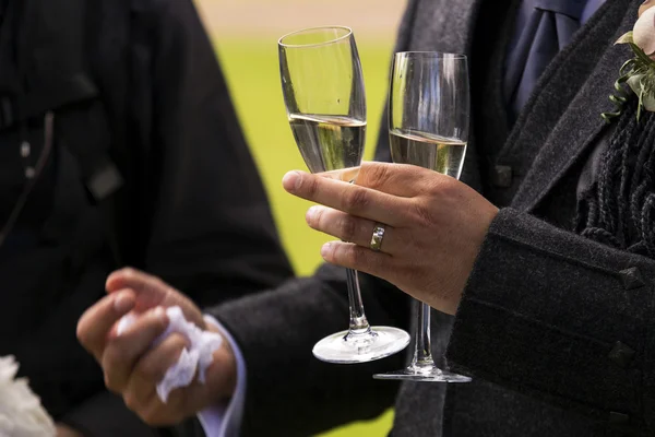 Man holding two champagne glasses — Stock Photo, Image