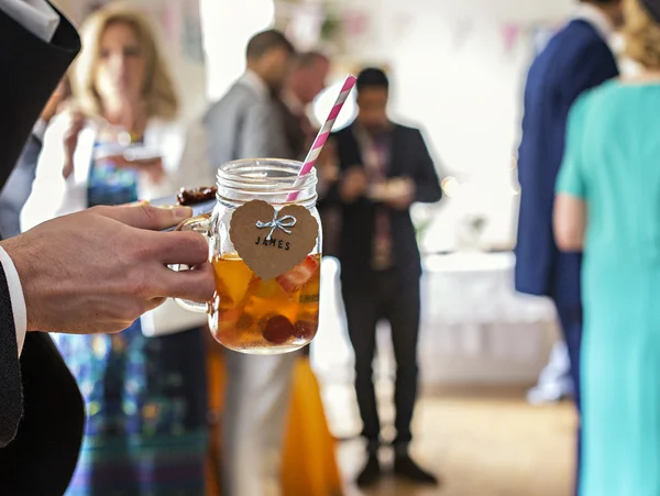 Man holding fancy wedding reception cup — Stock Photo, Image