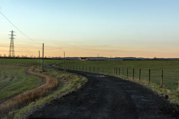 Alba sulla strada di campagna — Foto Stock