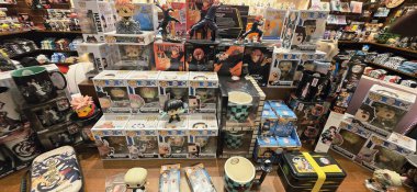 Berlin, Germany - June 13, 2025: Colorful display of anime merchandise and figurines in a vibrant retail store.