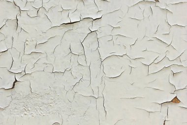 Eski boyalı bir duvar. Hasar yüzeyinin arkaplanı