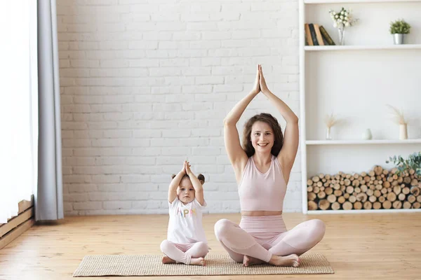 Beautiful Young Woman Charming Little Daughter Smiling While Doing Yoga — Stock Photo, Image