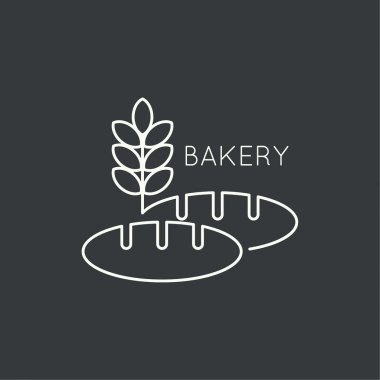 bir somun ekmek ve buğday kulak.