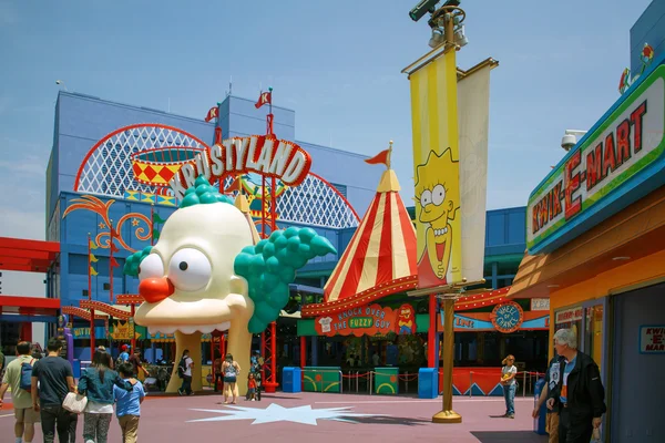 Simpson cavalca agli Universal Studios Immagine Stock