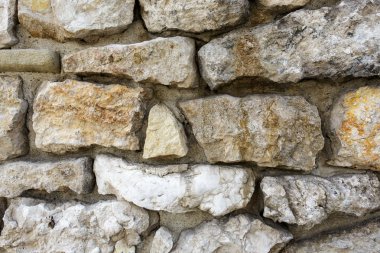 arkaplan olarak eski taş duvar
