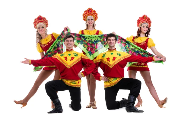 Dancer team wearing a folk costumes isolated on white — Stock Photo, Image