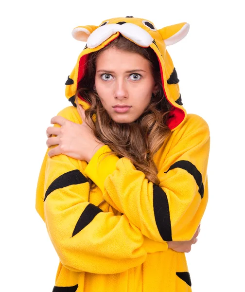 Scared young woman dressed as a tiger — Stock Photo, Image