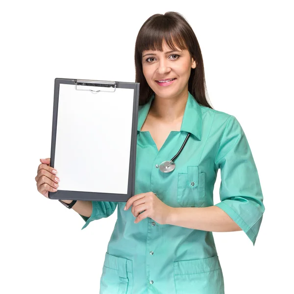 Mujer joven médico con cuaderno — Foto de Stock