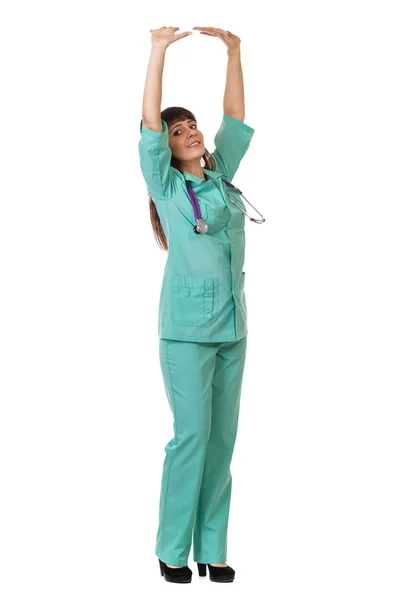 Kobieta lekarz pchanie lub opierając się na ścianie — Zdjęcie stockowe