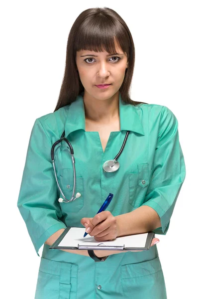 Νεαρή γυναίκα ιατρός με το σημειωματάριο — Φωτογραφία Αρχείου