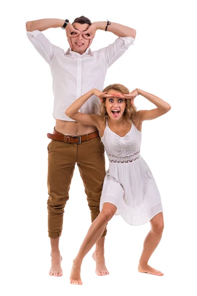 Surprised young couple on white background, isolated — Stock Photo, Image