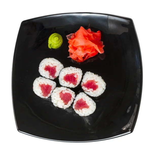 Traditionelle frische japanische Sushi-Rollen auf einem weißen — Stockfoto