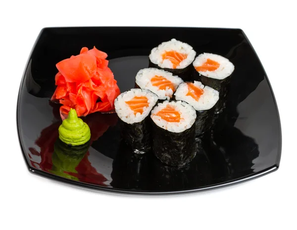 Traditionnel frais japonais sushi rouleaux sur un blanc — Photo