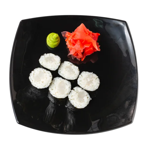 Tradicionales rollos de sushi japonés fresco en un blanco —  Fotos de Stock