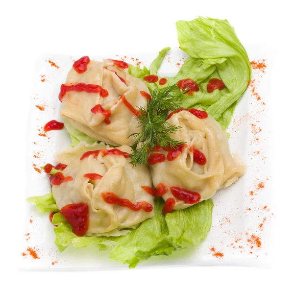 Meat dumplings on a white background — Stock Photo, Image