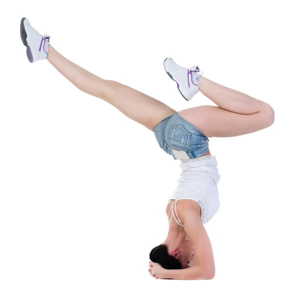 Young woman dancing, headstand isolated in full body on white — Stock Photo, Image