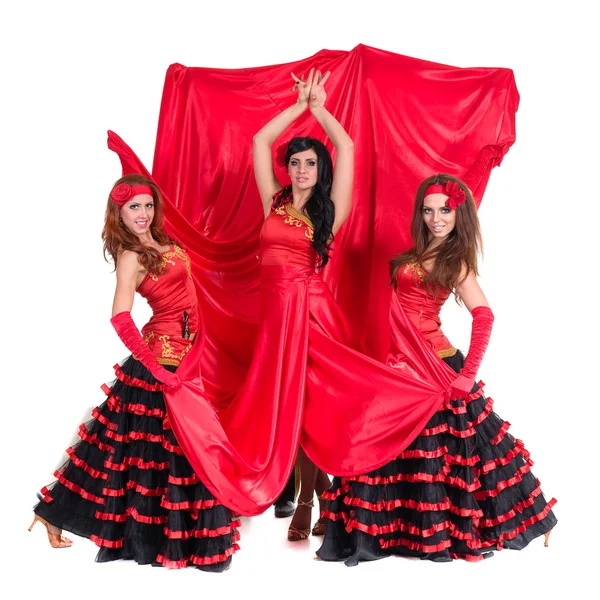 Tres bailarinas flamencas posando sobre un fondo blanco aislado — Foto de Stock