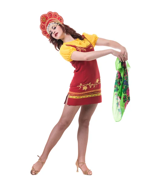 Young woman wearing a folk costumes dancing. Isolated on white in full length with copyspace — Stock Photo, Image