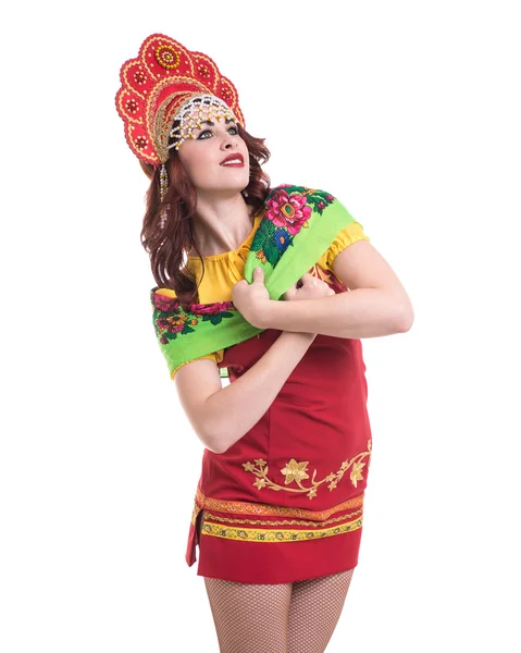 Mujer joven con trajes folclóricos bailando. Aislado en blanco con copyspace —  Fotos de Stock