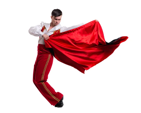 Dansende man draagt een toreador kostuum. Geïsoleerd op wit in volle lengte. — Stockfoto