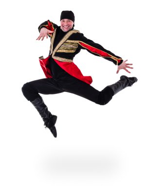 young man wearing a folk costume jumping against isolated white with copyspace clipart