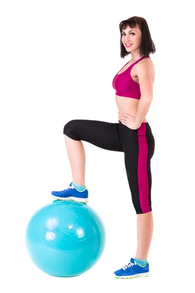 Young smiling woman makes exercise with fitball — Stock Photo, Image