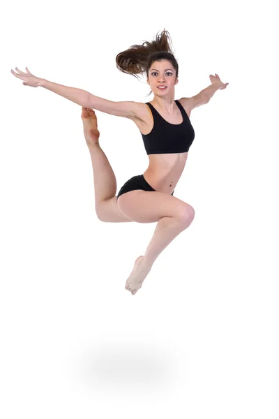 Young modern ballet dancer jumping on white background — Stock Photo, Image