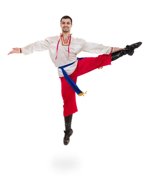 Young man wearing a folk costume jumping against isolated white with copyspace — Stock Photo, Image