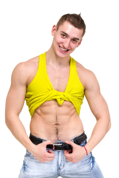 Muskulöses männliches Modell mit großem glücklichen Lächeln — Stockfoto