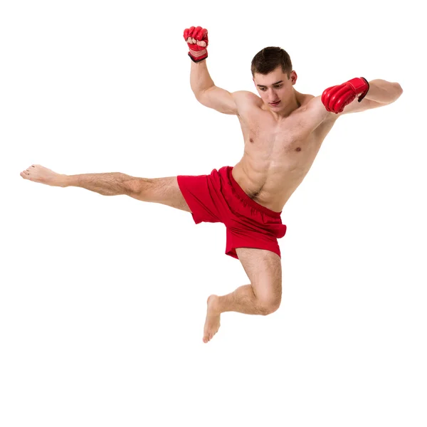 Full length portrait of young male boxer showing some movements against isolated white background — Stock Photo, Image