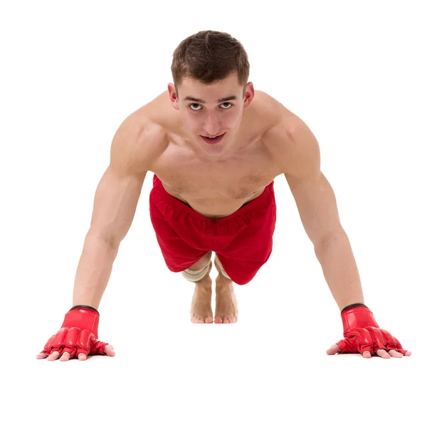 Volledige lengte portret van de jonge mannelijke bokser tonen enkele bewegingen tegen geïsoleerde witte achtergrond — Stockfoto