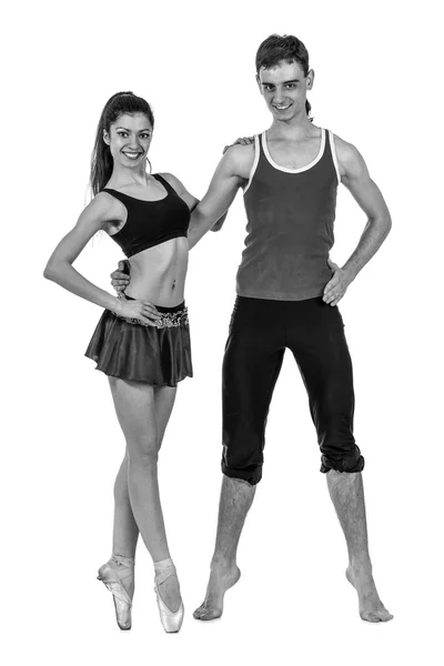 Colorless portrait of couple man and woman exercising fitness dancing on white background — Stock Photo, Image