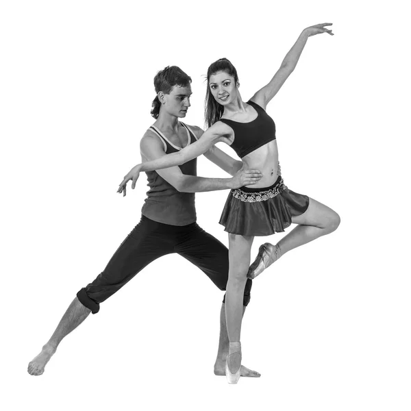 Colorless portrait of couple man and woman exercising fitness dancing on white background — Stock Photo, Image