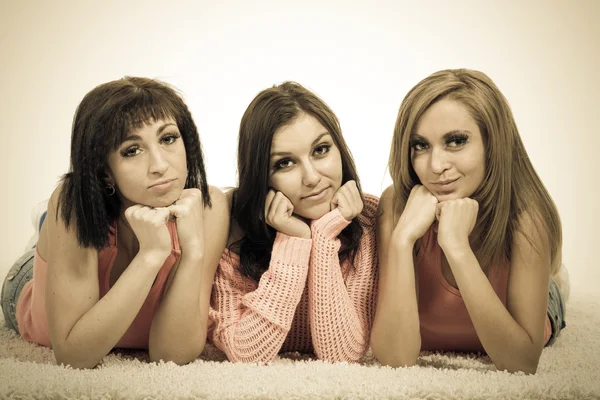 Styled portrait of three beautiful young women — Stock Photo, Image