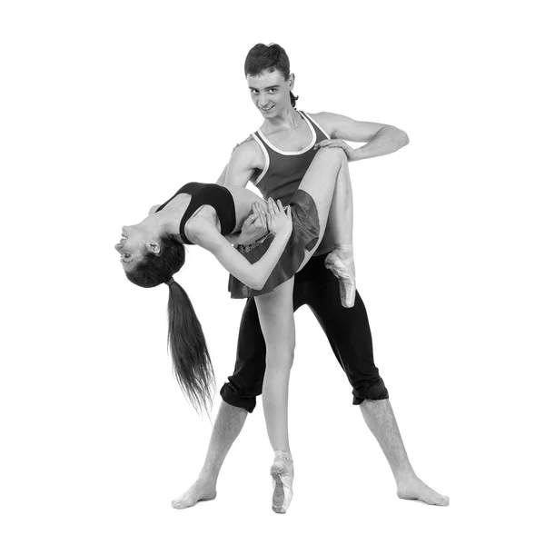 Colorless portrait of couple man and woman exercising fitness dancing on white background — Stock Photo, Image