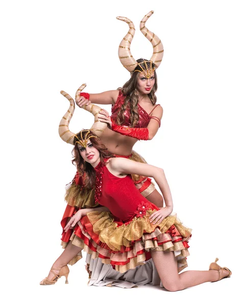 Two women dancers with horns. Isolated on white background. — Stock Photo, Image