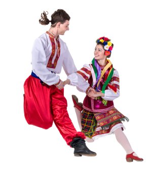 Zıplama, tam uzunlukta portre izole Polonya ulusal geleneksel kostümlü Çift dans