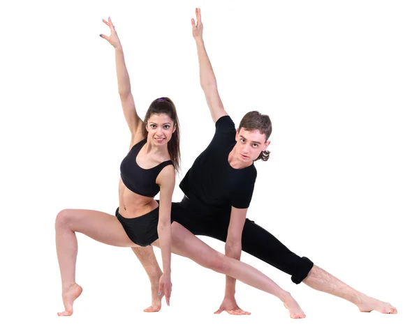 Casal homem e mulher exercitando fitness dançando no fundo branco — Fotografia de Stock